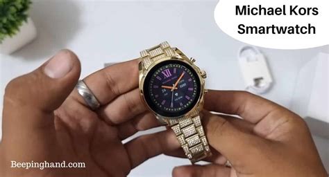 Michael Kors beeping hand